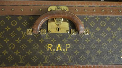 Lot 1170 - A Louis Vuitton Monogrammed Suitcase, with brass mounts, leather handles and trims, initialled...