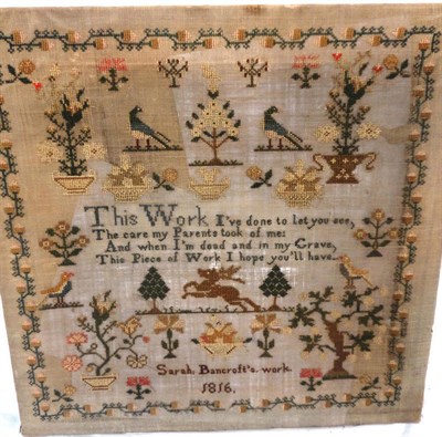 Lot 1178 - Unframed Sampler Worked by Sarah Bancroft Dated 1816, with central verse, stag, birds and...