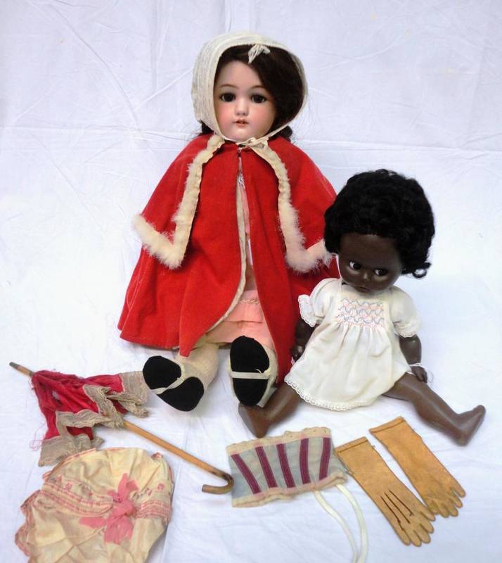 Lot 1003 - Simon and Halbig Bisque Socket Head Doll Impressed 'Jutta' '1349' with later brown wig,...