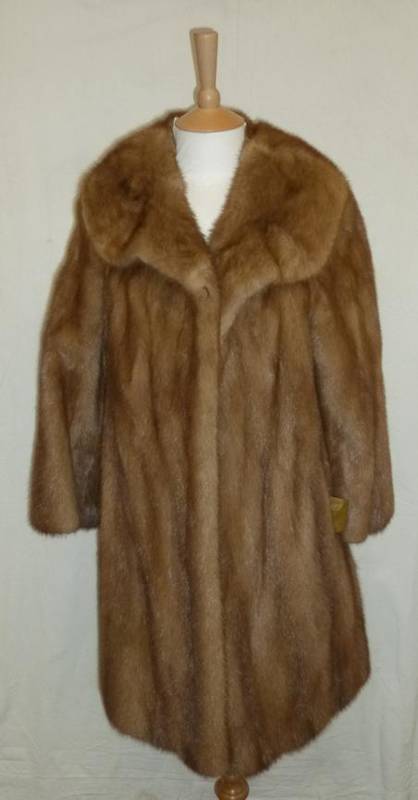 Lot 1095 - Solone Couture' Dark Mink Evening Jacket; 'Harrods' Blond Mink Coat and a Mink Stole (3)