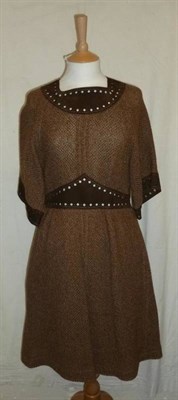 Lot 1107 - Jean Muir Brown Wool A-Line Shaped Dress in a loose weave, with side pockets, brown leather...