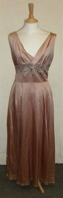 Lot 1114 - Twelve Assorted Circa 1950's and Later Evening Dresses, including 'Feminette Model Ltd'...