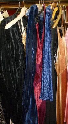 Lot 1124 - Assorted Circa 1930's and Later Evening Dresses, including a Blue Velvet Flocked Bias Cut...