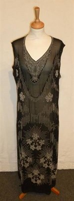 Lot 1148 - A Circa 1920's Black Chiffon and Beaded Shift Dress; and a Victorian Black Velvet Beaded Shrug (2)