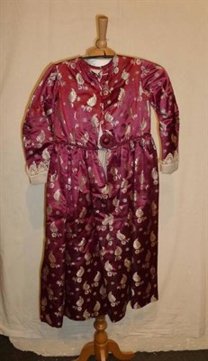 Lot 1151 - Early 20th Century Young Girls Plum Coloured Silk Dress embroidered with flowers and leaves,...