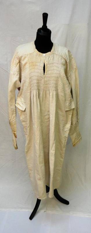 Lot 1159 - Late 19th Century Linen Farmer's Smock, with smocked detailing to the front, back and cuffs,...