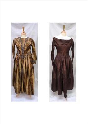 Lot 1162 - 19th Century Brown Silk Dress with long sleeves, gathered skirt, deep quilted hem, fine pleated...