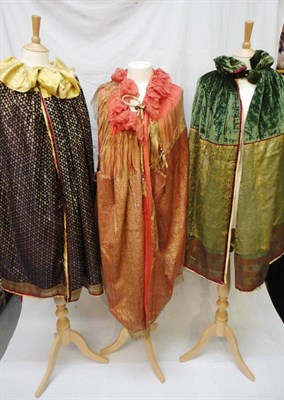 Lot 1168 - Three Early 20th Century Cloaks of silk brocade and silk linings made from silk brought back...