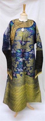 Lot 1174 - 20th Century Blue Silk Robe, decorated with dragons and decorative motifs above a wave hem