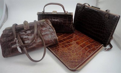 Lot 1182 - Two Brown Crocodile Leather Waldybags with suede linings, both have replacement handles; Brown...