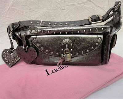 Lot 1205 - Luella 'Joni' Pewter Coloured Leather Bag, with zip to the top and leather heart attachments,...