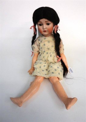 Lot 1002 - Simon and Halbig Bisque Socket Head Doll, with sleeping brown eyes, replacement wig, on a...