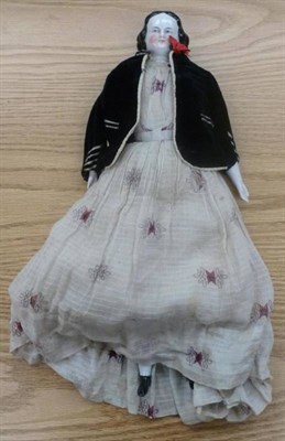 Lot 1004 - Victorian China Shoulder Head Doll, with black moulded and painted hair and face, blue eyes and...