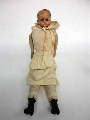 Lot 1007 - Composition Shoulder Head Doll, with blue intaglio eyes, wig missing, on a fabric body wearing...
