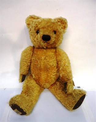Lot 1018 - A Chad Valley Yellow Plush Jointed Teddy Bear, with stitched nose, rexine paws and growler,...