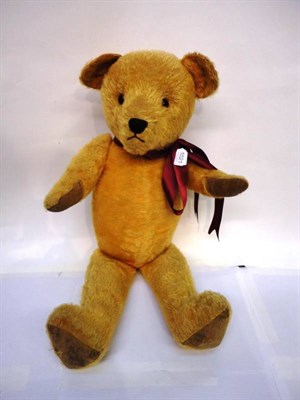 Lot 1021 - A Circa 1930's Large Yellow Plush Jointed Teddy Bear, with stitched nose, painted fabric pads...