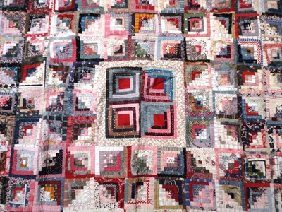 Lot 1031 - Late 19th Century Log Cabin Patchwork Quilt, 165cm by 230cm