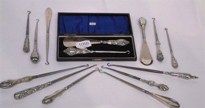 Lot 1050 - Silver Handled Button Hook and Shoe Horn Set in a fitted case, marked Chester 1913; eleven assorted