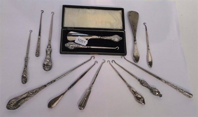 Lot 1051 - Silver Handled Button Hook and Shoe Horn Set in a fitted case, marked Chester 1911; ten...
