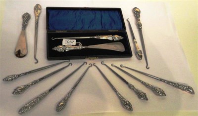 Lot 1057 - Silver Handled Button Hook and Shoe Horn Set in a fitted case, marked Birmingham 1904; eleven...