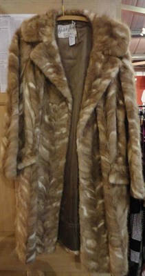 Lot 1072 - Capstick & Hamer Ltd Chevron Striped Fur Coat in pale brown and white; and A Stole (2)