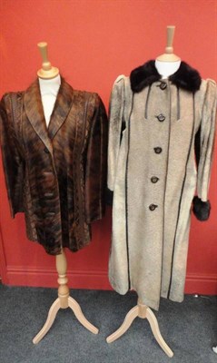 Lot 1078 - Sealskin Coat with leather trims and brown fur collar; Brown Long Hide Jacket with leather...