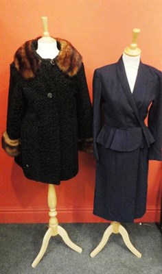 Lot 1095 - Astraka of London Black Astrakan Coat with fur cuffs and collar; Black Coat with a black fur...