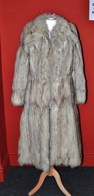 Lot 1100 - Full Length White Fox Fur Coat with grey leather trims