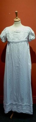 Lot 1162 - 19th Century Costume including an early White Cotton Empire Style Dress with long sleeves and...