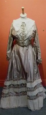 Lot 1163 - Late 19th Century Pale Brown Silk Two Piece with fitted bodice, lace trimmed cuffs and ribbon...