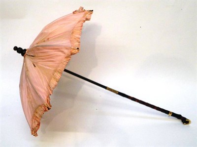 Lot 1172 - Late 19th Century Ivory Parasol with a carved intertwined handle, purple silk mount, lace trims...