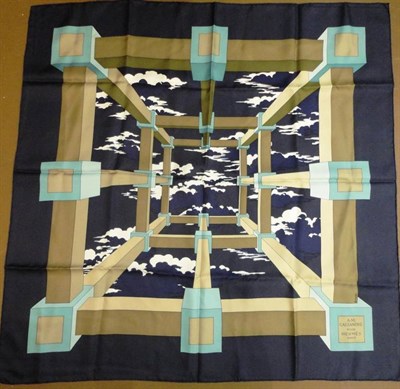 Lot 1201 - Hermes Silk Scarf 'Perspective', designed by A M Cassandre with navy blue border, 90cm