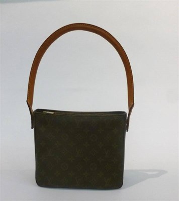 Lot 1203 - Louis Vuitton Monogrammed Canvas Shoulder Bag, with tan leather shoulder strap, suede lining,...