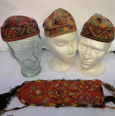 Lot 1217 - Thirteen Assorted Central Asian Cotton Embroidered and Woven Hats, some with bead or mica...