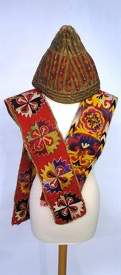 Lot 1218 - Seven Assorted Central Asian Caps/Helmets, and two appliqued bands of fabric