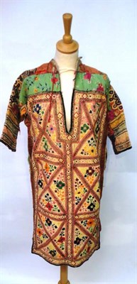 Lot 1219 - Three Rajastan, West India, Cotton Tunics, embroidered with brightly coloured cotton etc