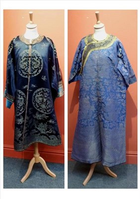 Lot 1222 - Chinese Blue Silk Jacket, woven with decorative roundels, figures and floral motifs in a...