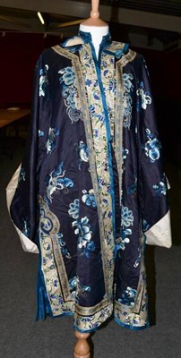 Lot 1223 - Late 19th Century Blue Silk Chinese Jacket, embroidered with blue and white flowers to the...