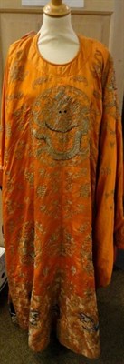 Lot 1224 - Late 19th Century Orange Silk Chinese Robe, embroidered with silver thread decorated with ten...