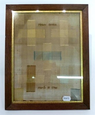 Lot 1230 - A Possibly Quaker Oak Framed Embroidered Darning Sampler, worked on a linen in ground by Miriam...