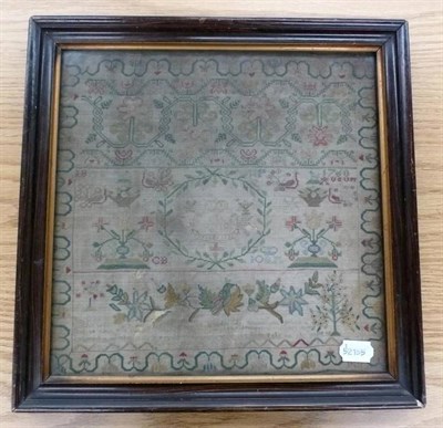 Lot 1243 - Framed Sampler Dated August 1760, worked in silk with a central wreath enclosing two birds...