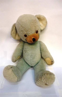 Lot 1018A - A Merrythought Pale Blue Plush Cheeky Teddy Bear, with stitched nose and claws, white felt pads...
