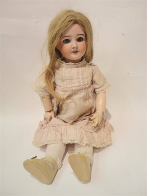 Lot 1004 - French SFBJ 301 Bisque Socket Head Doll, with replacement blonde wig, pierced ears, sleeping...