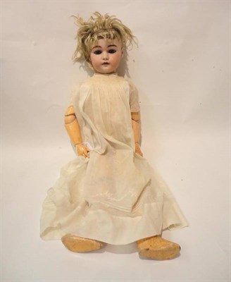 Lot 1007 - Simon and Halbig Bisque Socket Head Doll impressed 1079, with original blonde wig, pierced...