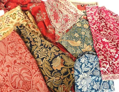 Lot 1028 - Assorted Woven, Printed and Embroidered Lengths of Fabric including a small panel bearing paper...
