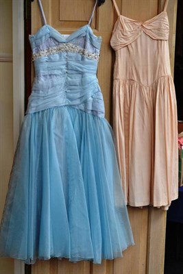 Lot 1132 - Circa 1950's and 1960's Evening Dresses including a Russell Stuart Pink and Gold Floral Brocade...