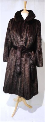 Lot 1143 - A Harrods Mink Coat, three quarter length with tie waist