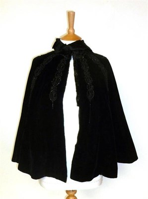 Lot 1168 - 19th Century Black Jacket with appliqued trims; Black Velvet Cape with beaded trims; Gents Blue...