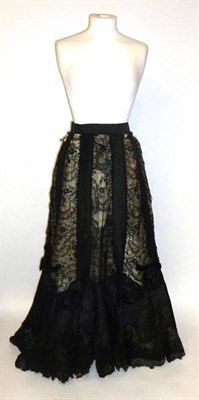 Lot 1171 - 19th Century Silk Skirt with pleated detailing and lace mounts, train back and lace mounted...