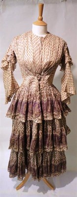 Lot 1177 - Mid 19th Century Cotton Day Dress, printed in a paisley design with a tiered skirt and similar...